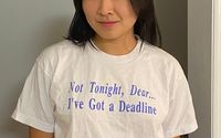 An image of Cat Zhang wearing a shirt that reads "Not tonight, dear...I've got a deadline"